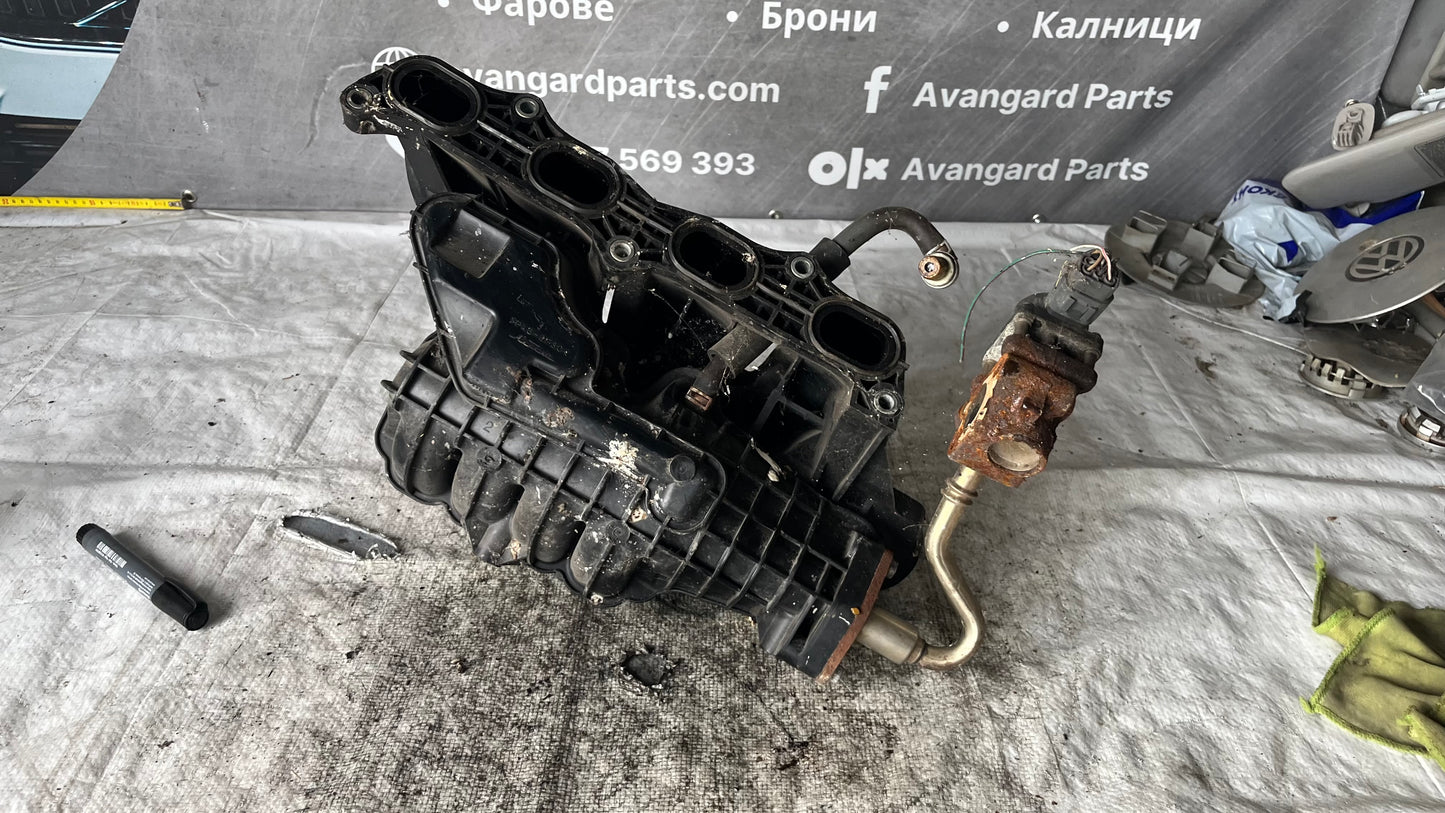 Suzuki Swift 2005 1.3бензин колектор