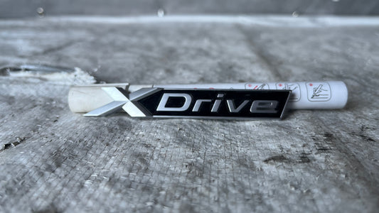 BMW X-Drive емблема