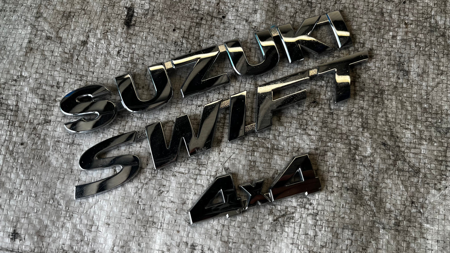 Suzuki Swift 4X4 емблеми