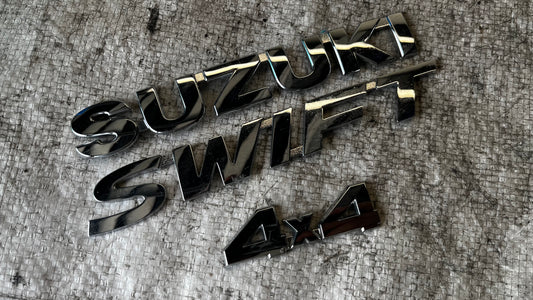 Suzuki Swift 4X4 емблеми