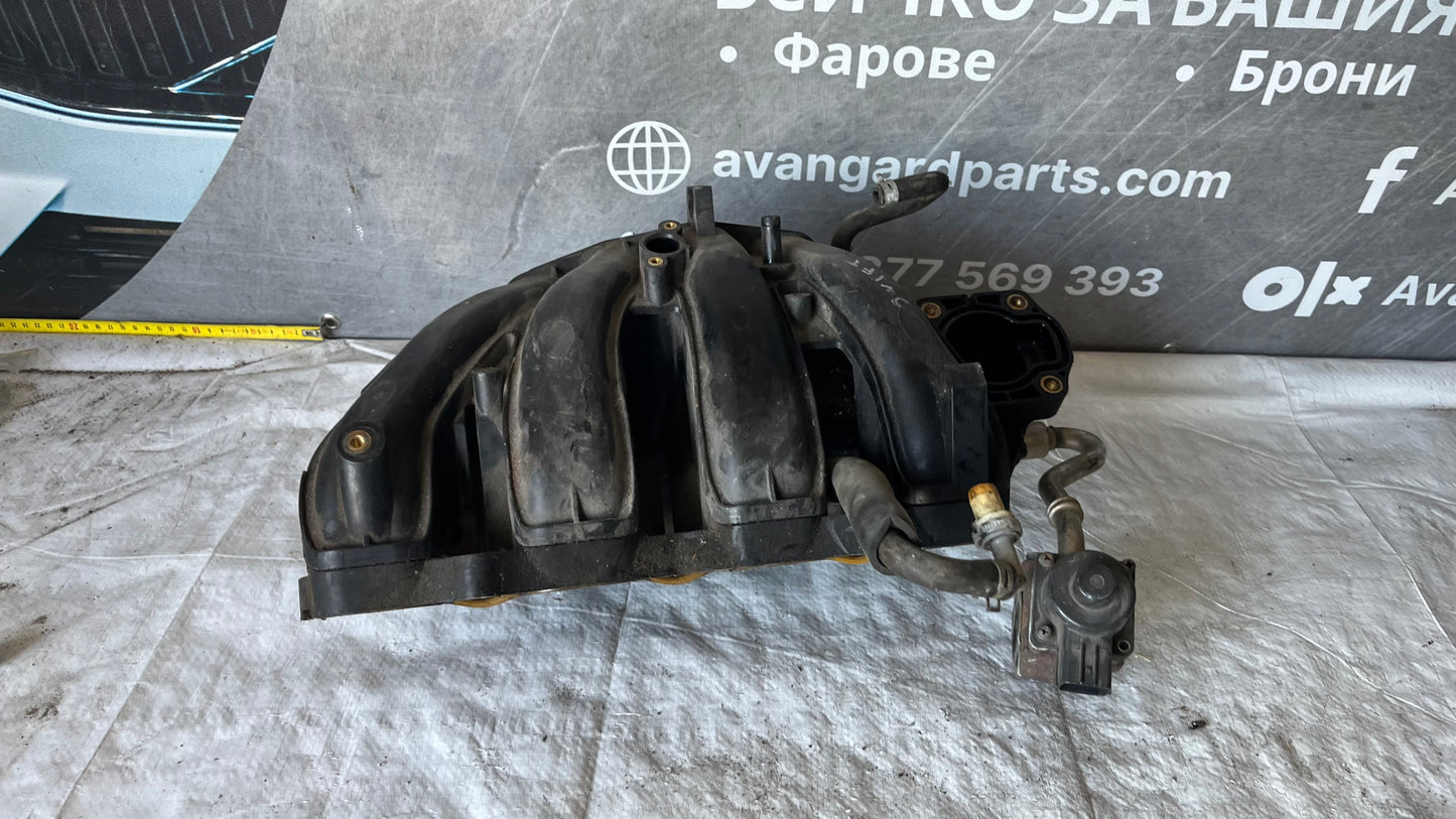 Suzuki Swift 2005 1.3бензин колектор