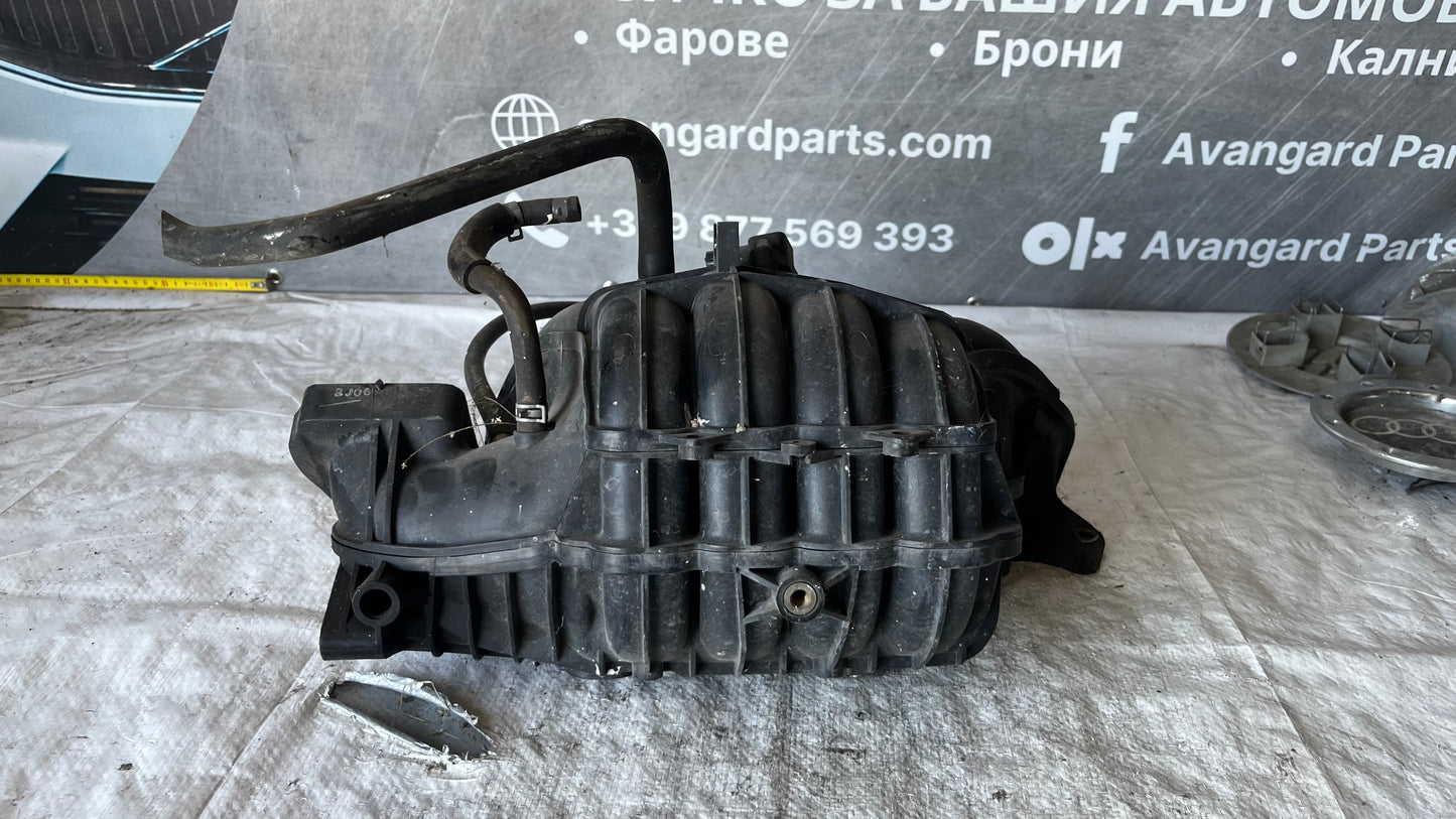 Suzuki Swift 2005 1.3бензин колектор