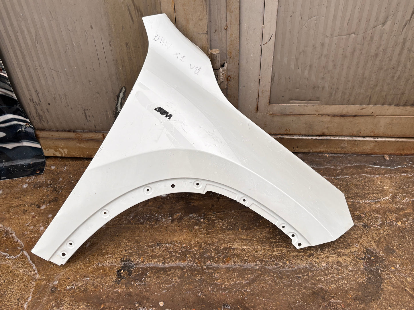 Калник преден десен • BMW X1 U11 •